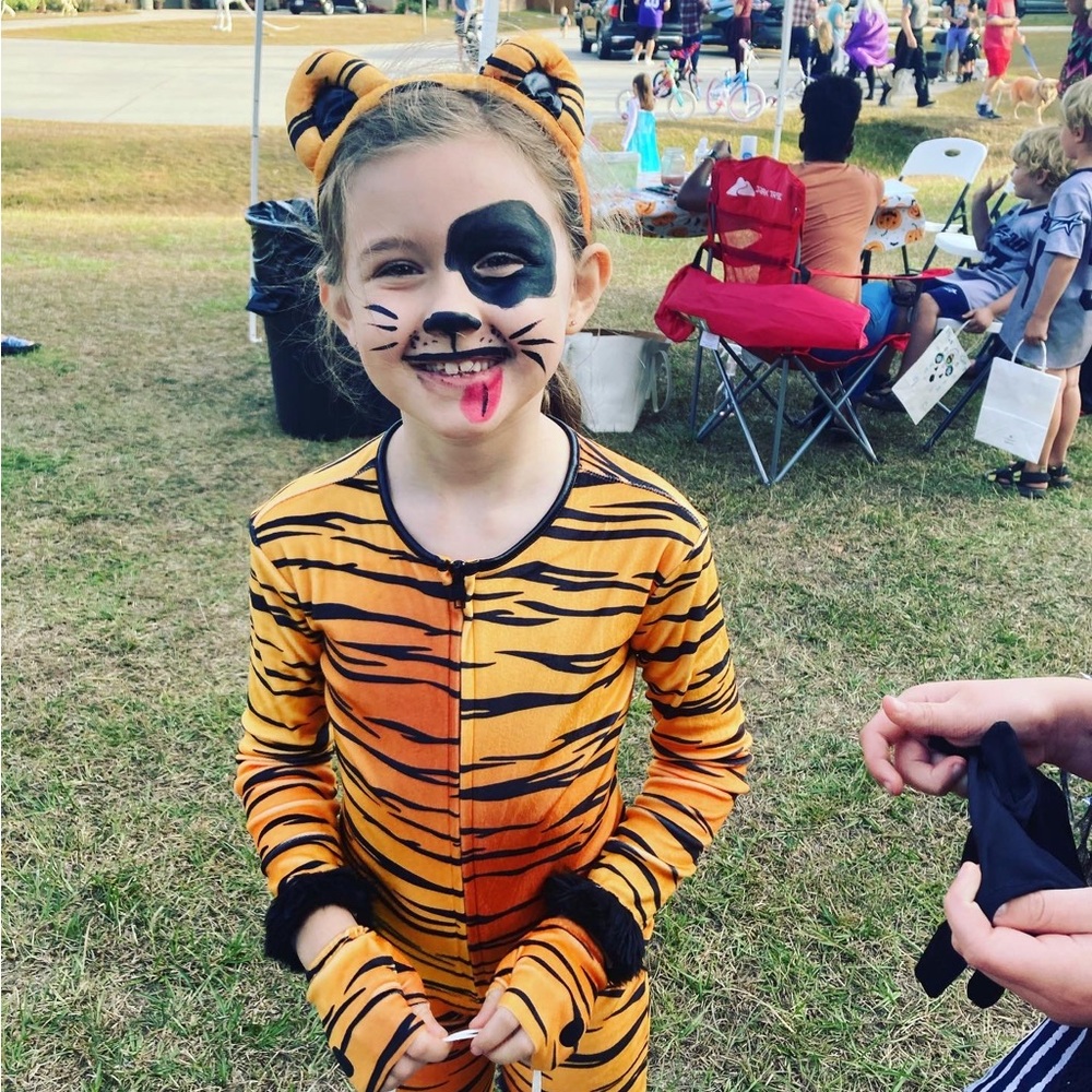 Tiger costume. Worn once. All parts included. Headband, gloves, tail attached.